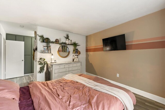 6780 Friars Rd Unit 243, San Diego, CA 92108 - bedroom with wood finished floors and baseboards