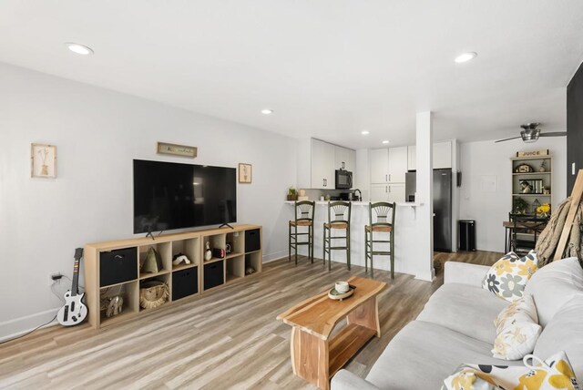 6780 Friars Rd Unit 243, San Diego, CA 92108 - living room featuring light wood-style floors and recessed lighting