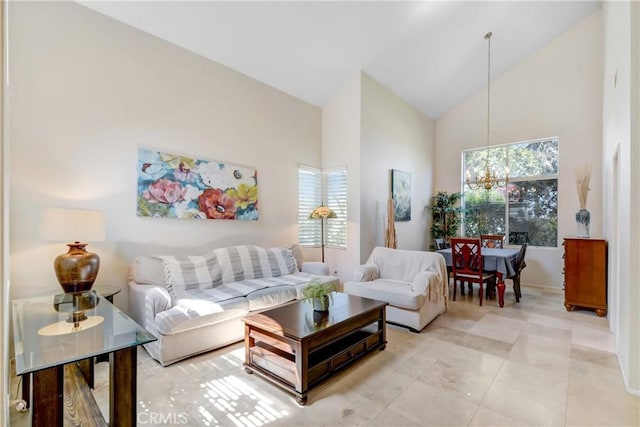 living room featuring high vaulted ceiling