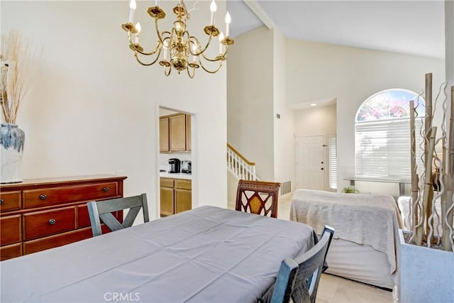 dining area featuring high vaulted ceiling, stairway, and a chandelier