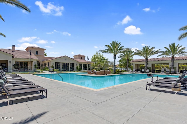 pool with a patio
