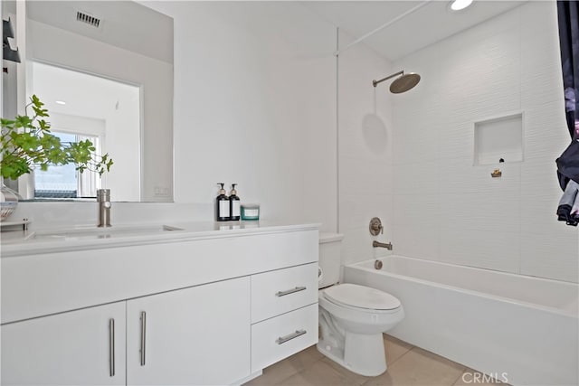 bathroom featuring visible vents, toilet, tile patterned floors, vanity, and  shower combination