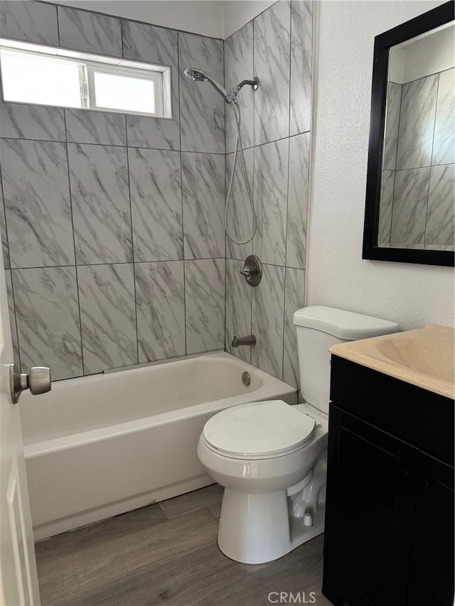 518 E 2nd St, Rialto, CA 92376 - full bathroom featuring vanity, shower / tub combination, and wood finished floors