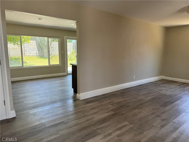 518 E 2nd St, Rialto, CA 92376 - empty room featuring dark wood-style flooring