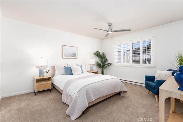 carpeted bedroom featuring crown molding, baseboards, baseboard heating, and a ceiling fan