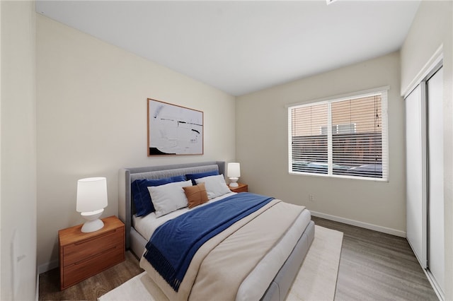 24898 Sunset Vista Ave, Menifee, CA 92584 - bedroom with wood finished floors and baseboards