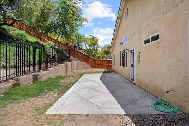 24898 Sunset Vista Ave, Menifee, CA 92584 - fenced backyard featuring a patio area