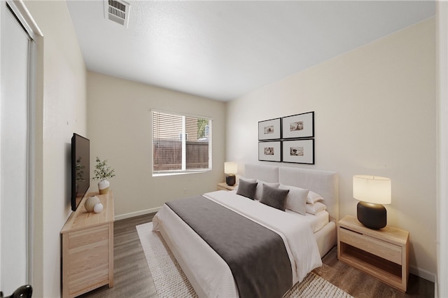 24898 Sunset Vista Ave, Menifee, CA 92584 - bedroom featuring wood finished floors and baseboards