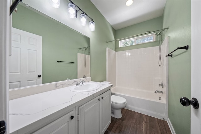 24898 Sunset Vista Ave, Menifee, CA 92584 - bathroom with toilet, shower / bathtub combination, vanity, wood finished floors, and baseboards