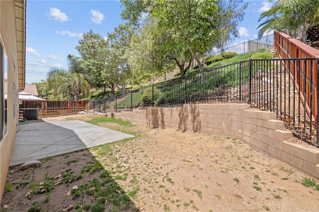 24898 Sunset Vista Ave, Menifee, CA 92584 - fenced backyard with a patio area and cooling unit