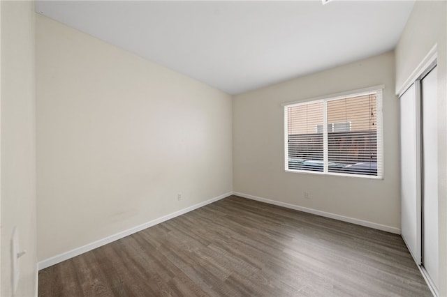 24898 Sunset Vista Ave, Menifee, CA 92584 - unfurnished room with wood finished floors and baseboards