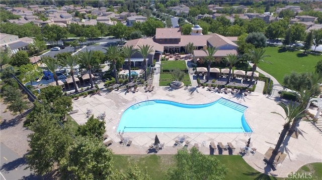 birds eye view of property with a residential view