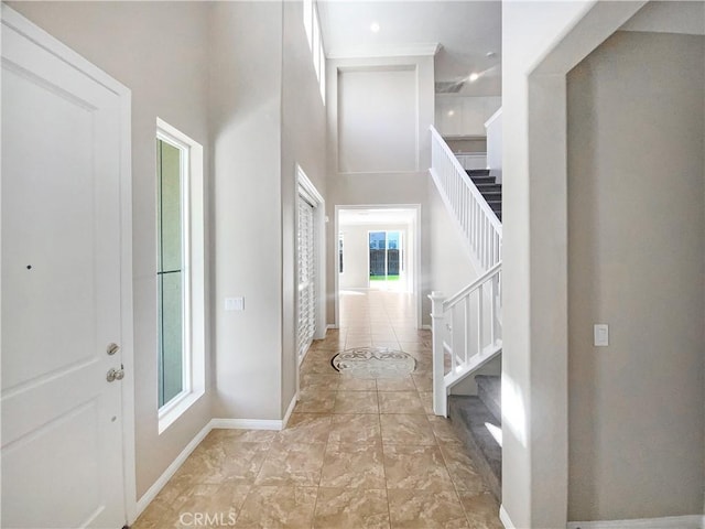 28861 Topsfield Ct, Temecula, CA 92591 - entryway with stairway, baseboards, and a towering ceiling