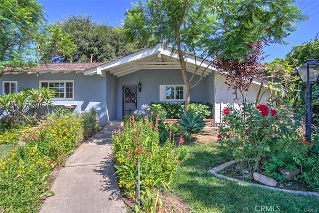 12472 Woodlawn Ave, Tustin, CA 92780 - ranch-style home with stucco siding