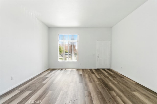 595 Casey Ct, Colton, CA 92324 - unfurnished room with wood finished floors and baseboards