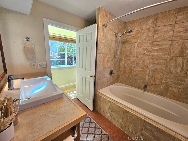 1631 Salem St, Chico, CA 95928 - bathroom featuring tiled shower / bath, tile patterned floors, and vanity