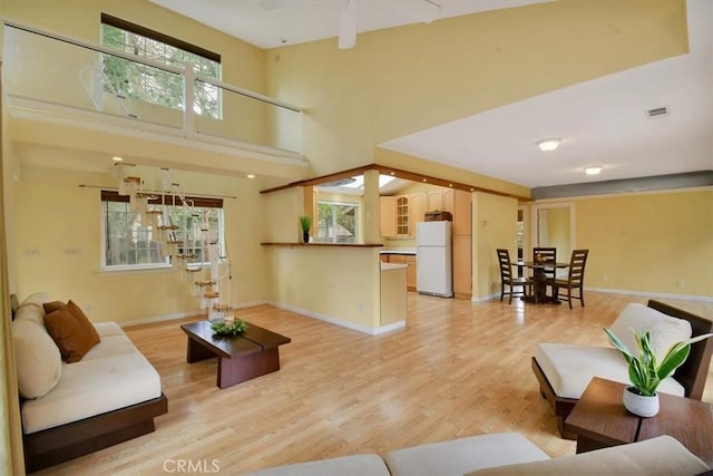1631 Salem St, Chico, CA 95928 - living area featuring light wood finished floors and a high ceiling