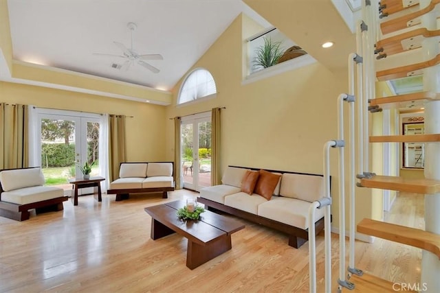 1631 Salem St, Chico, CA 95928 - living room with french doors, ceiling fan, wood finished floors, and high vaulted ceiling