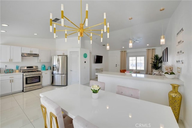82235 Calico Ave, Indio, CA 92201 - dining room with high vaulted ceiling, recessed lighting, a chandelier, ceiling fan, and light tile patterned floors