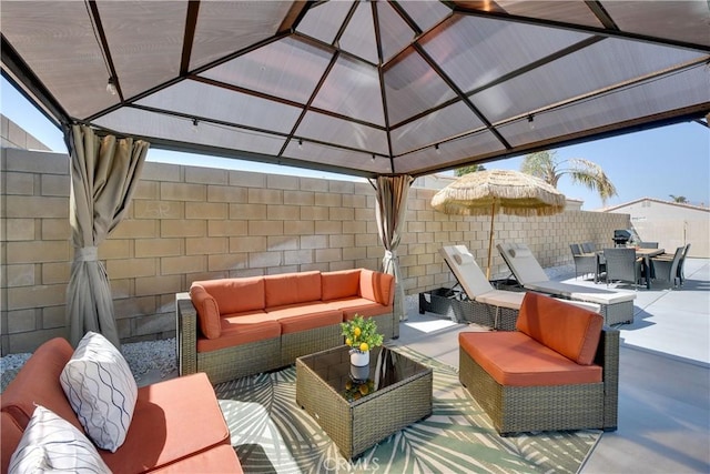 82235 Calico Ave, Indio, CA 92201 - view of patio / terrace featuring a gazebo, an outdoor hangout area, outdoor dining space, and a fenced backyard