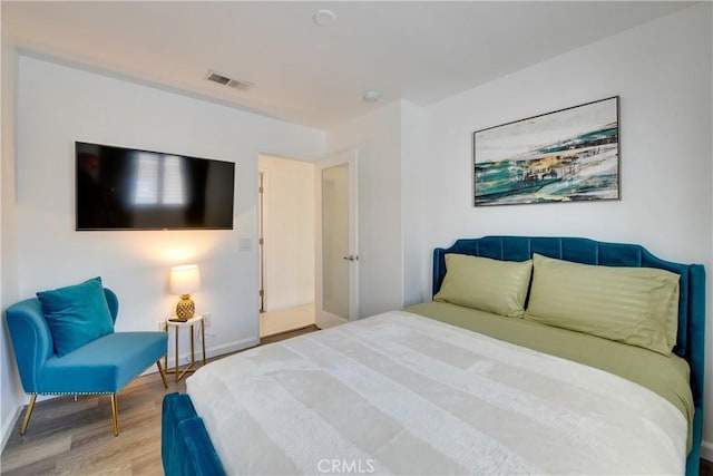 82235 Calico Ave, Indio, CA 92201 - bedroom with wood finished floors and baseboards