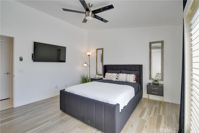 82235 Calico Ave, Indio, CA 92201 - bedroom featuring light wood-type flooring, baseboards, and a ceiling fan