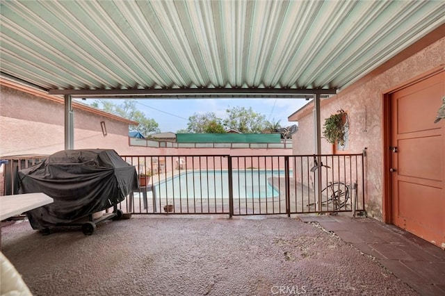 view of patio / terrace featuring a fenced in pool, area for grilling, and a fenced backyard