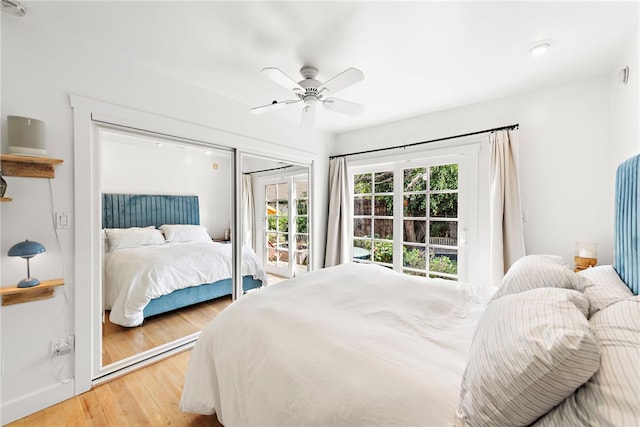 bedroom featuring light wood-type flooring and a ceiling fan