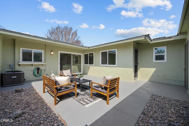 view of patio / terrace with an outdoor living space and cooling unit