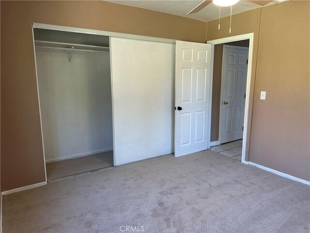 878 E Holly St, Rialto, CA 92376 - unfurnished bedroom with carpet flooring, a closet, and ceiling fan
