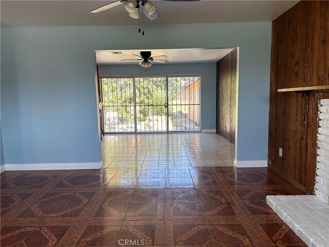 878 E Holly St, Rialto, CA 92376 - unfurnished living room with a ceiling fan