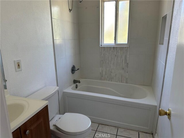 878 E Holly St, Rialto, CA 92376 - full bathroom featuring vanity, tub / shower combination, tile patterned floors, and a textured wall