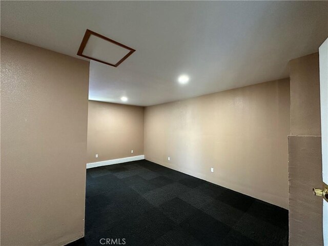 878 E Holly St, Rialto, CA 92376 - spare room with recessed lighting and dark carpet