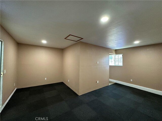 878 E Holly St, Rialto, CA 92376 - unfurnished room with recessed lighting and dark colored carpet