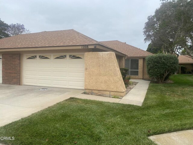 1208 Village 1 Unit 1208, Camarillo, CA 93012 - single story home featuring driveway, an attached garage, a shingled roof, a front lawn, and stucco siding