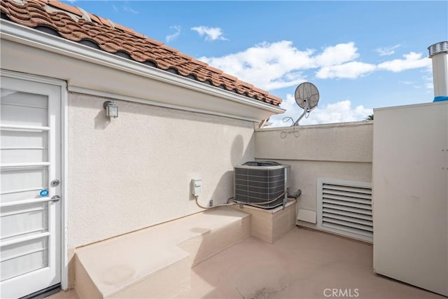 view of patio with central AC unit