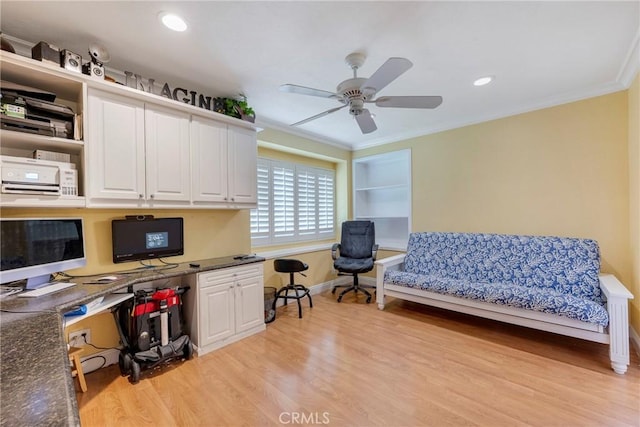 office area with light wood finished floors, baseboards, recessed lighting, ceiling fan, and ornamental molding