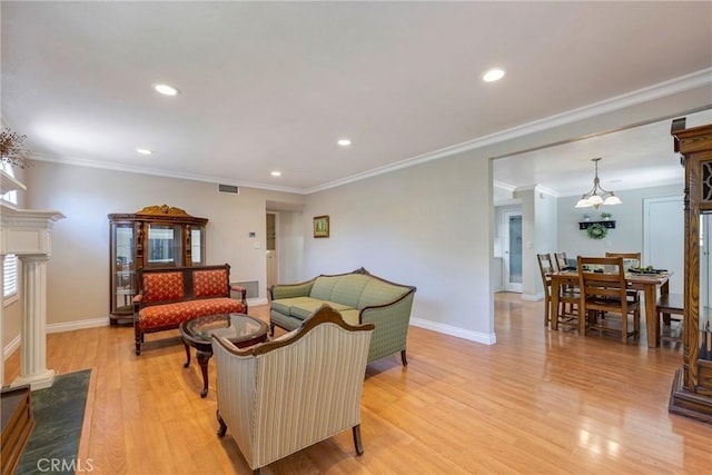 living area featuring recessed lighting, light wood-type flooring, and baseboards