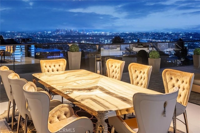 tiled dining area with a city view