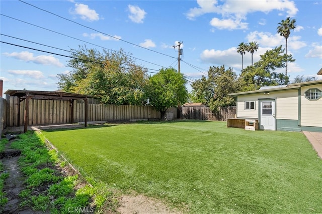 view of yard with a fenced backyard