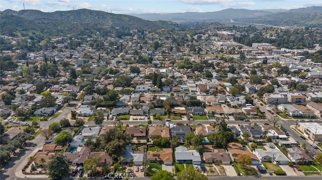 drone / aerial view with a mountain view and a residential view