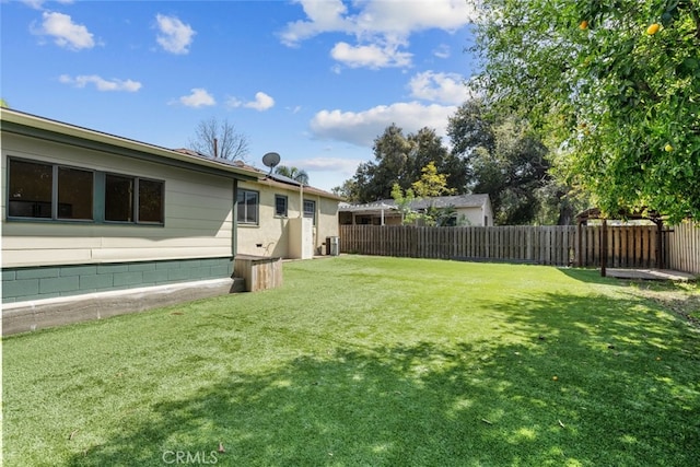 view of yard with fence