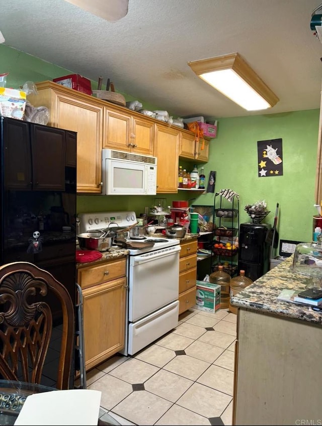 2041 E Grand Ave Unit 48, Escondido, CA 92027 - kitchen featuring white appliances, light tile patterned floors, and a textured ceiling