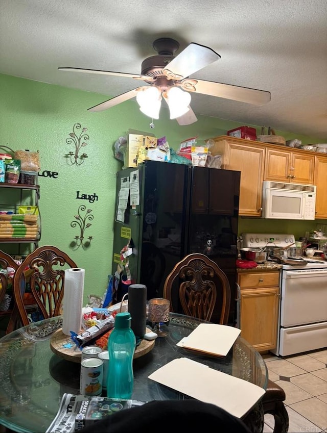 2041 E Grand Ave Unit 48, Escondido, CA 92027 - dining area with ceiling fan, a textured ceiling, a textured wall, and light tile patterned flooring