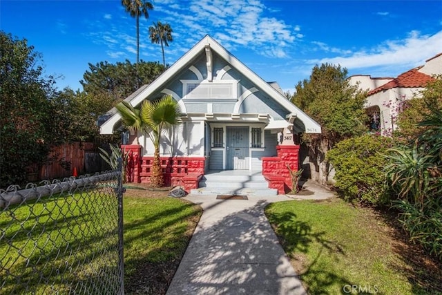 3417 4th Ave, Los Angeles, CA 90018 - view of front of home with fence and a front lawn