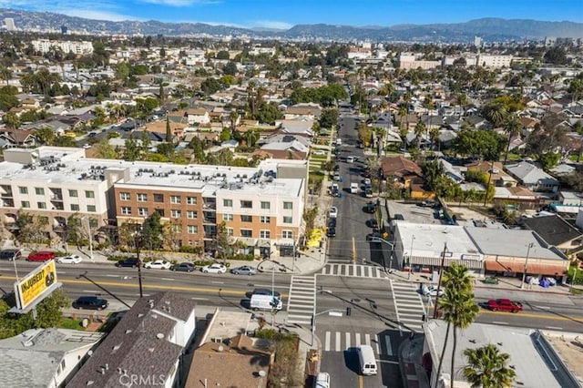 3417 4th Ave, Los Angeles, CA 90018 - drone / aerial view with a residential view and a mountain view