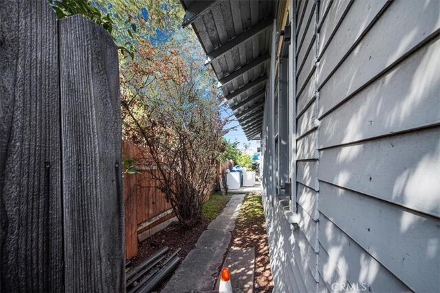 3417 4th Ave, Los Angeles, CA 90018 - view of property exterior with fence and crawl space