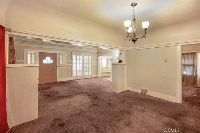 3417 4th Ave, Los Angeles, CA 90018 - entryway featuring carpet floors, an inviting chandelier, and visible vents