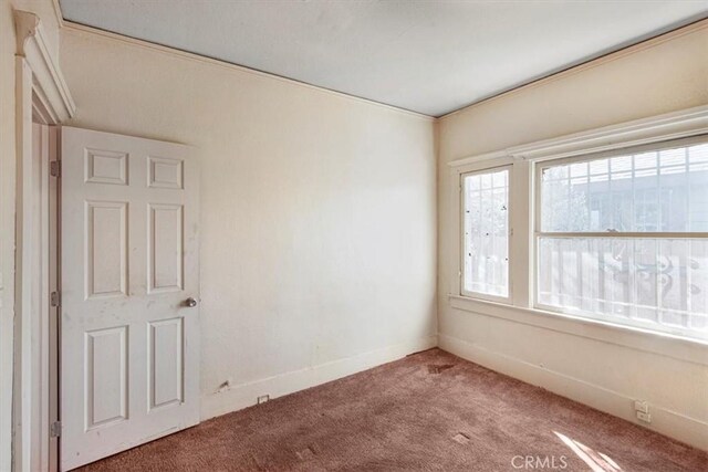 3417 4th Ave, Los Angeles, CA 90018 - carpeted spare room with baseboards
