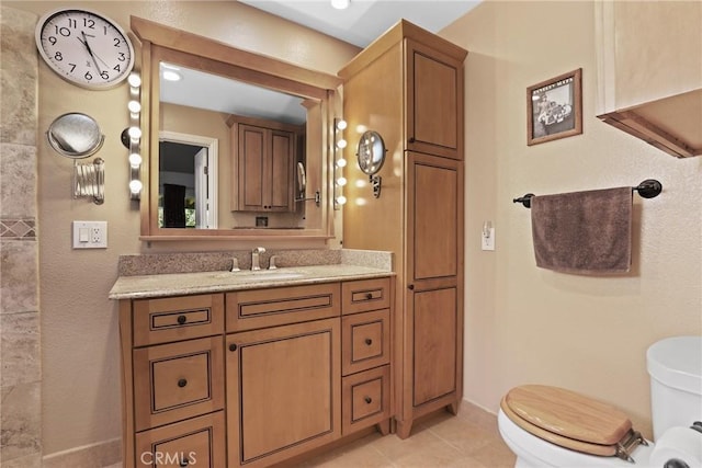 3291 Lemon Dr, Simi Valley, CA 93063 - bathroom with toilet, tile patterned flooring, vanity, and baseboards